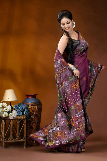 Deep plum multi-thread floral handcrafted silk lambani embroidery saree woman wears richly patterned purple 5