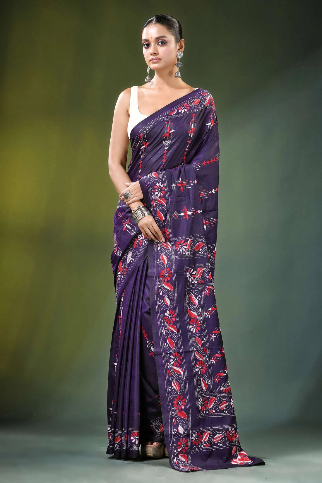 Deep purple floral vine handcrafted silk kantha stitch saree woman wears 1