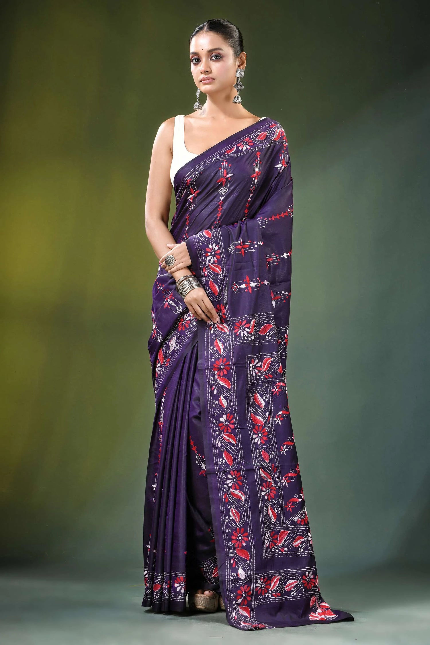 Deep purple floral vine handcrafted silk kantha stitch saree woman wears 1