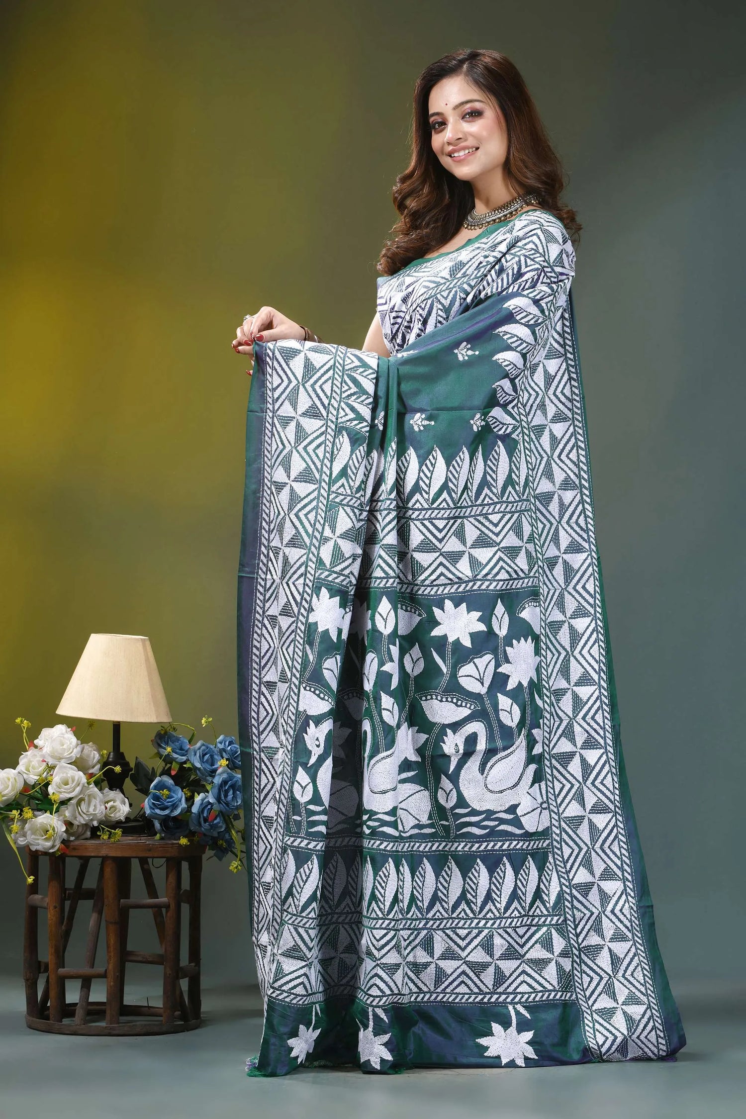 Deep teal swan design kantha embroidery silk saree woman wears green white printed 3