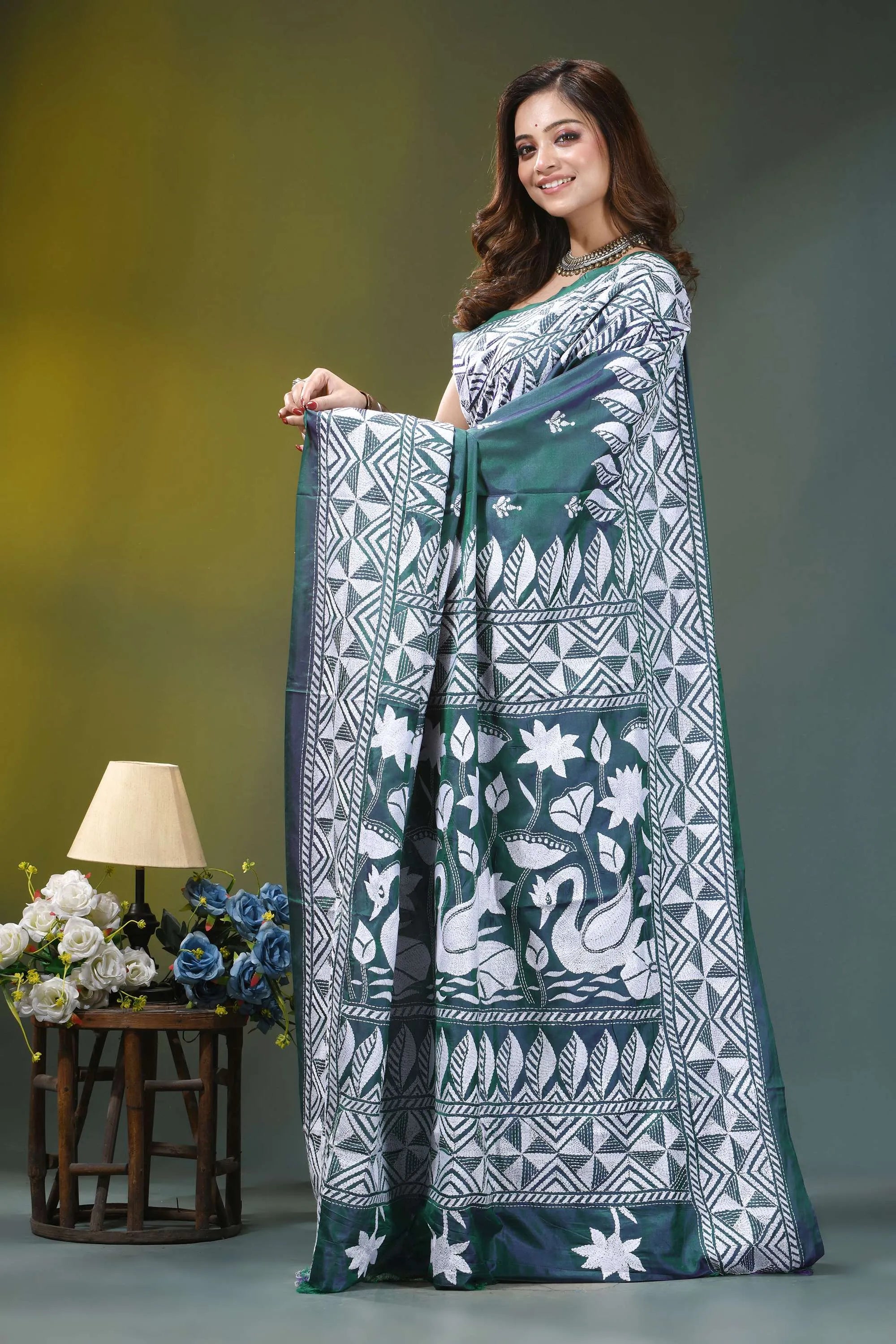 Deep teal swan design kantha embroidery silk saree woman wears green white printed 3