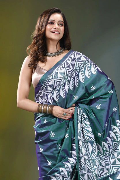Deep teal swan design kantha embroidery silk saree woman wears vibrant emerald green 2