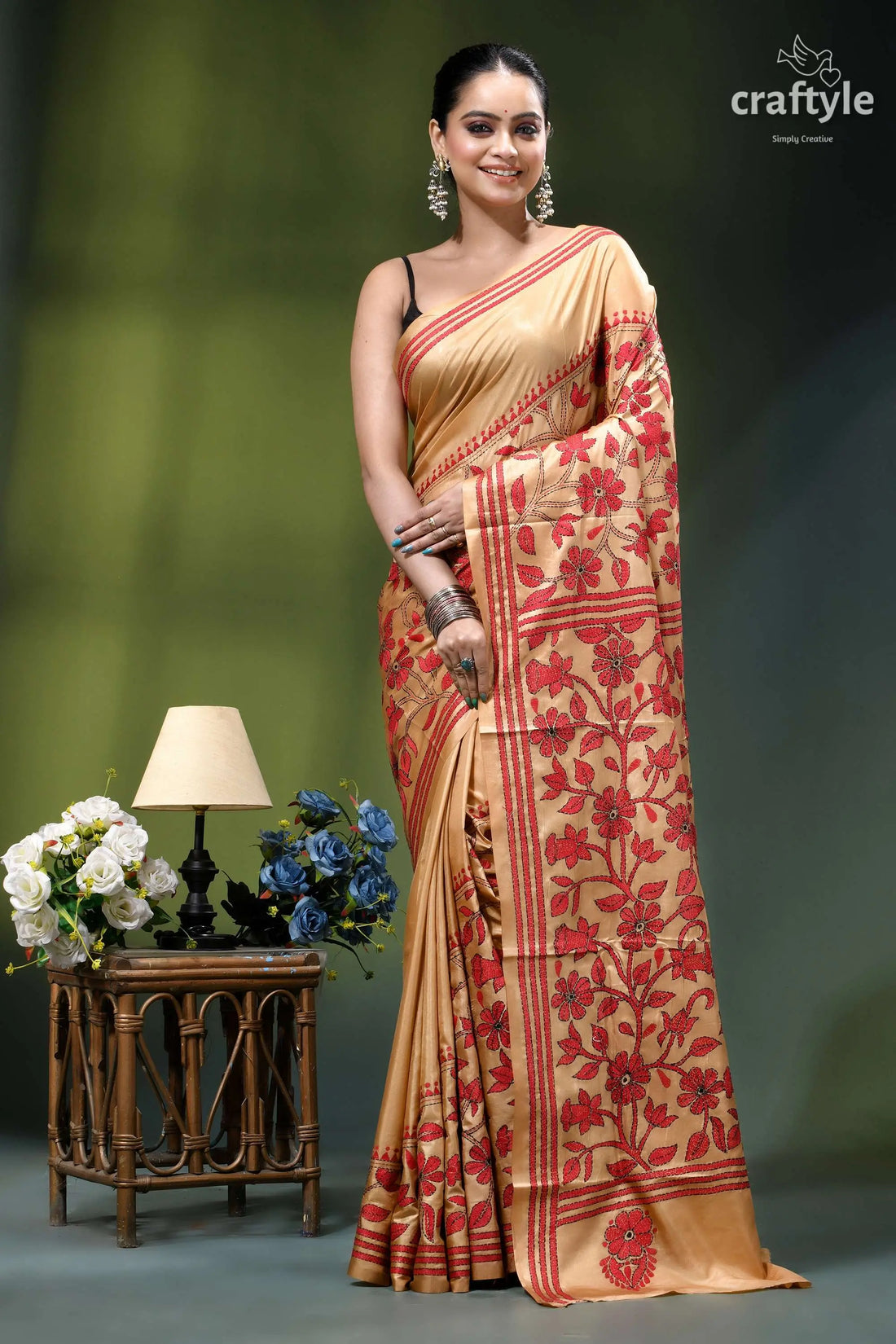 Desert sand red thread work floral silk kantha embroidery saree woman wears beige saree intricate 1