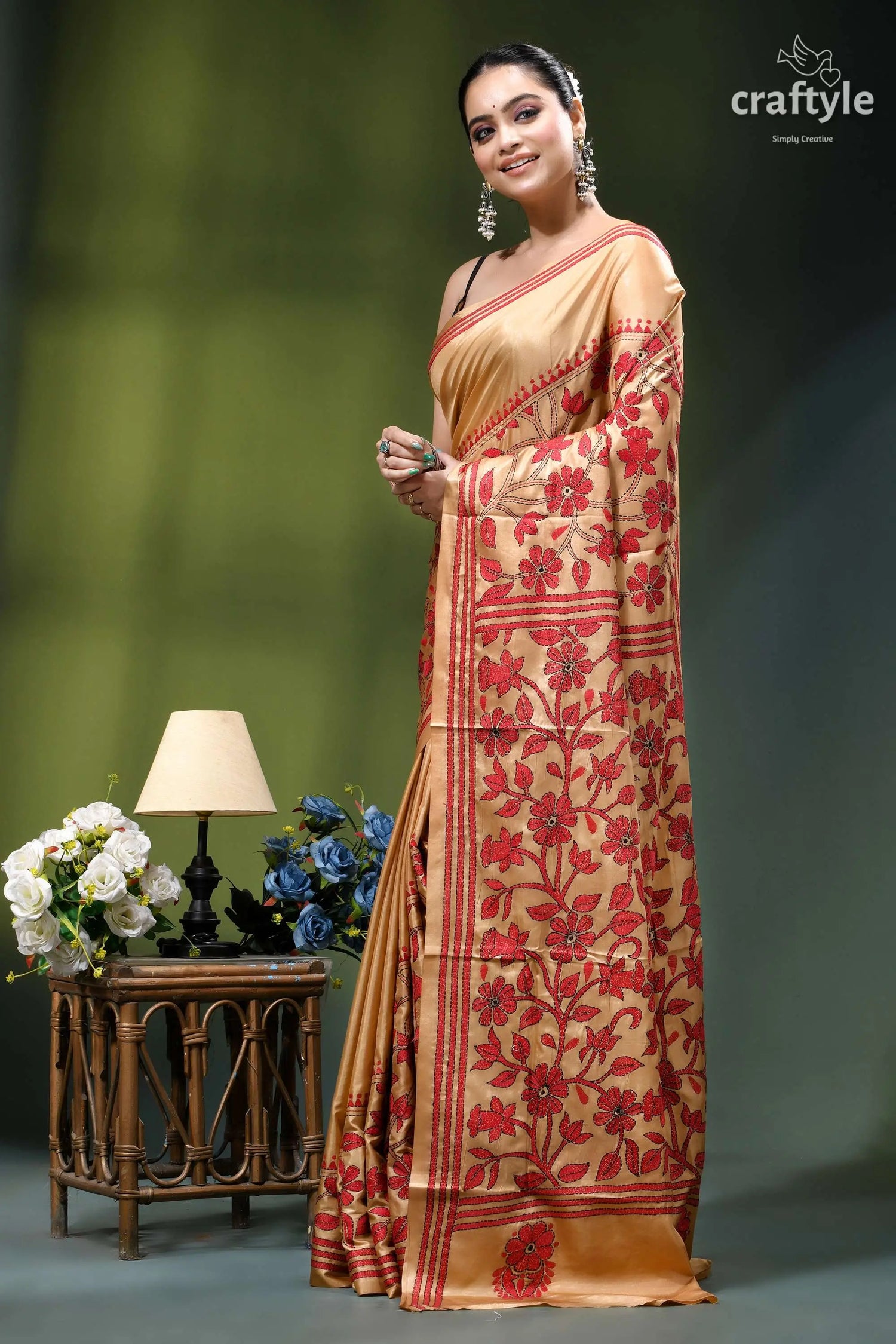 Desert sand red thread work floral silk kantha embroidery saree woman wears beige silk saree 3