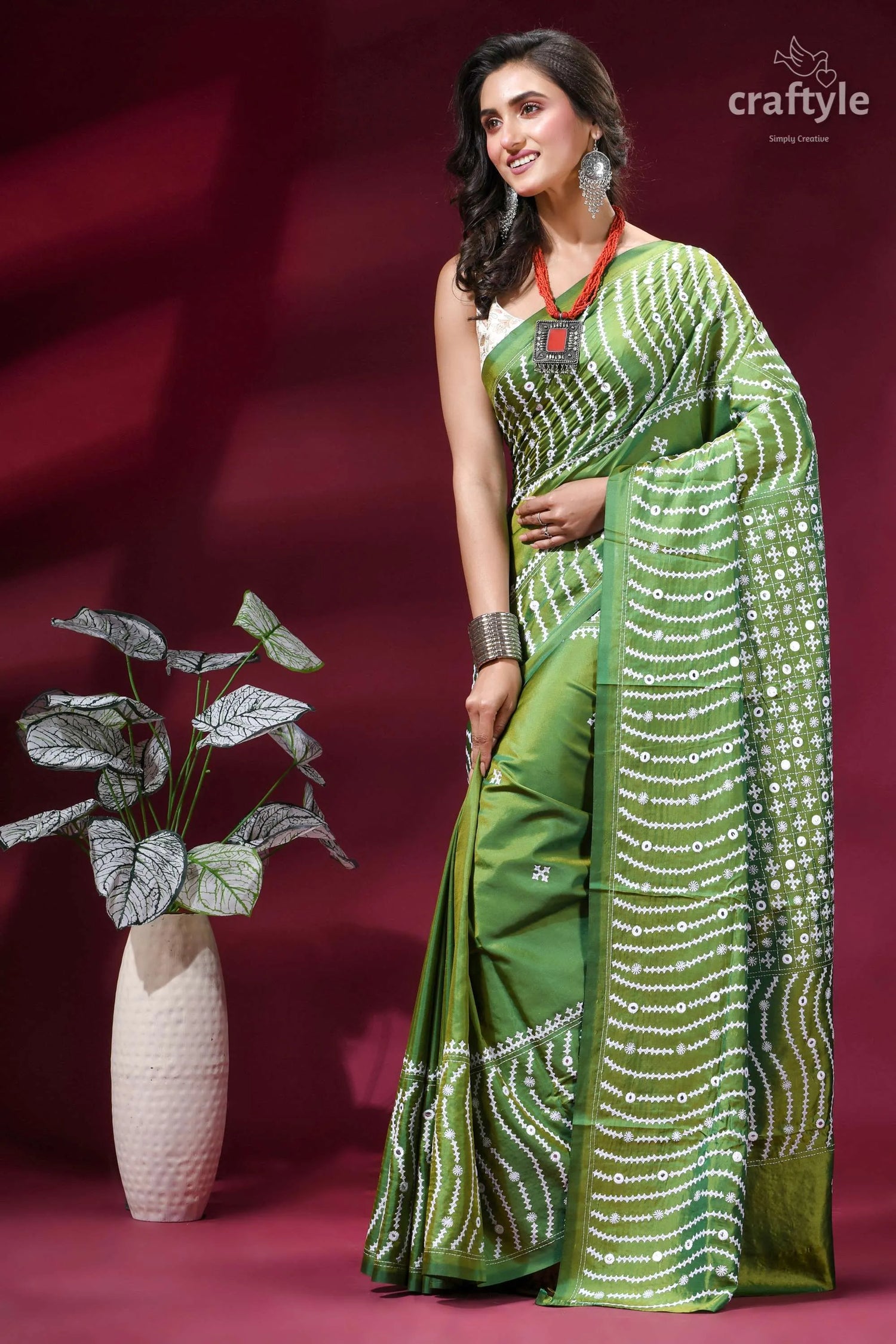 Drab green intricate gujrati stitch silk saree with mirror work vibrant green saree intricate white 3