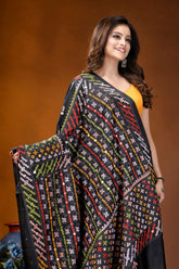 Ebony black multicolor hand-stitched kutch work silk saree with mirror detailing black embroidered saree vibrant