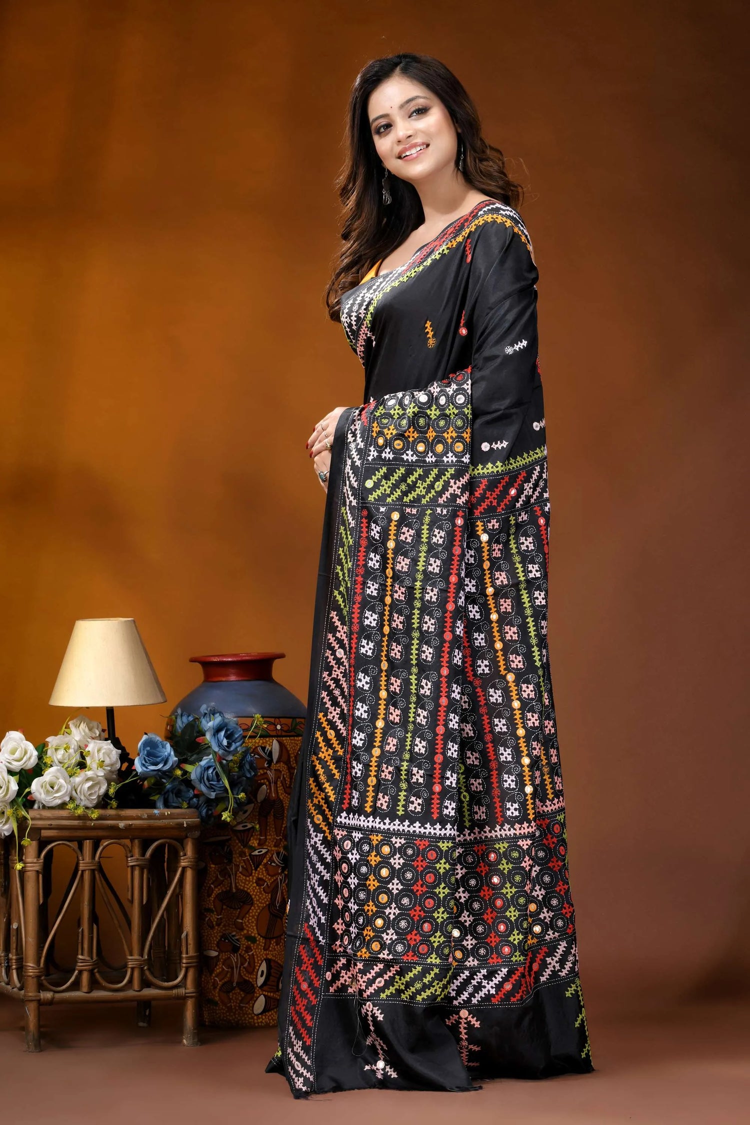 Ebony black multicolor hand-stitched kutch work silk saree with mirror detailing black saree vibrant multicolored