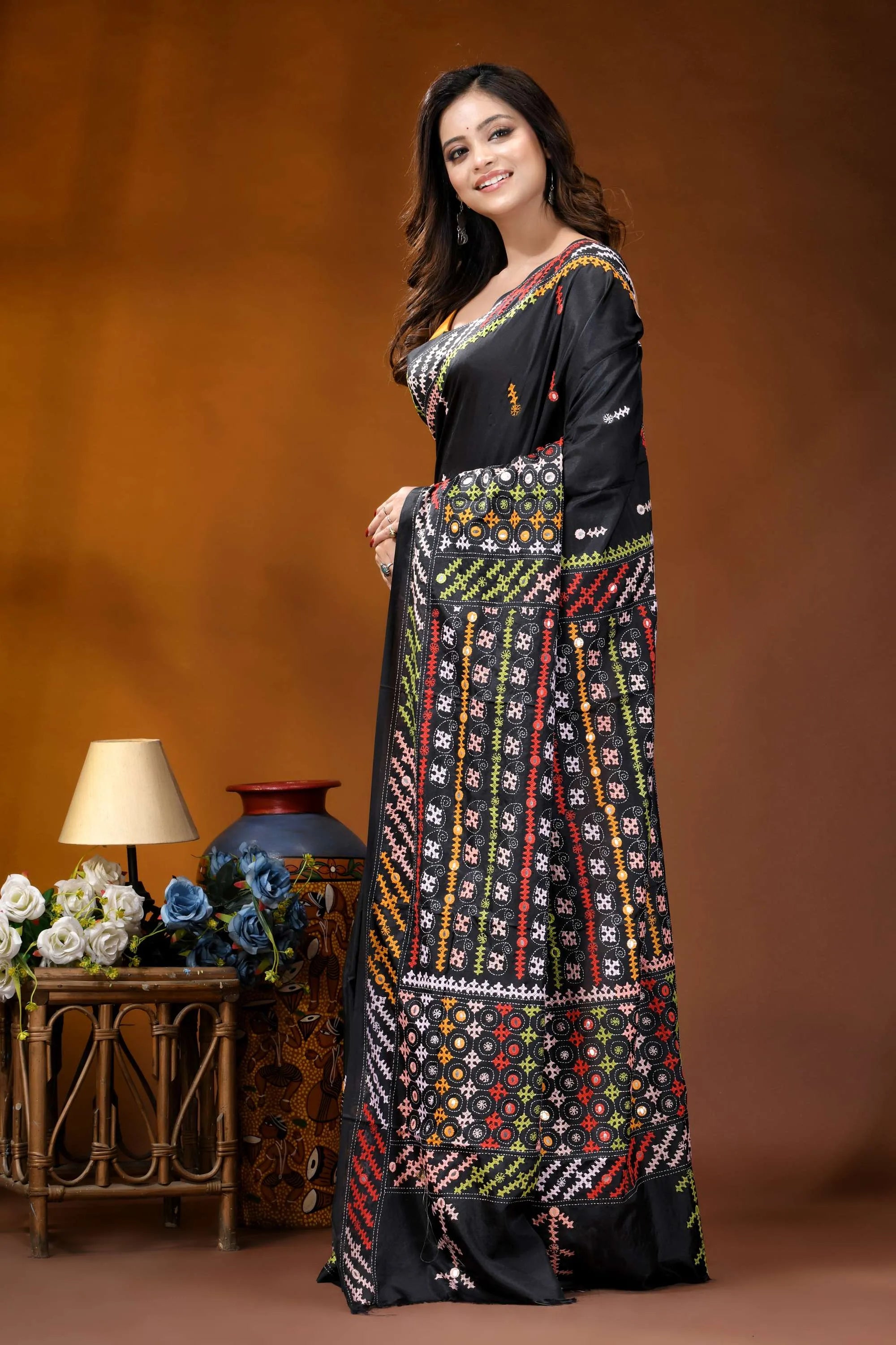 Ebony black multicolor hand-stitched kutch work silk saree with mirror detailing black saree vibrant multicolored