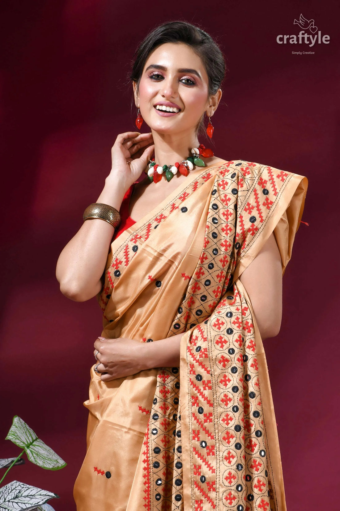 Ethnic design kutch embroidery silk saree in sorrell brown - mirror work woman wears golden-brown silk saree 2