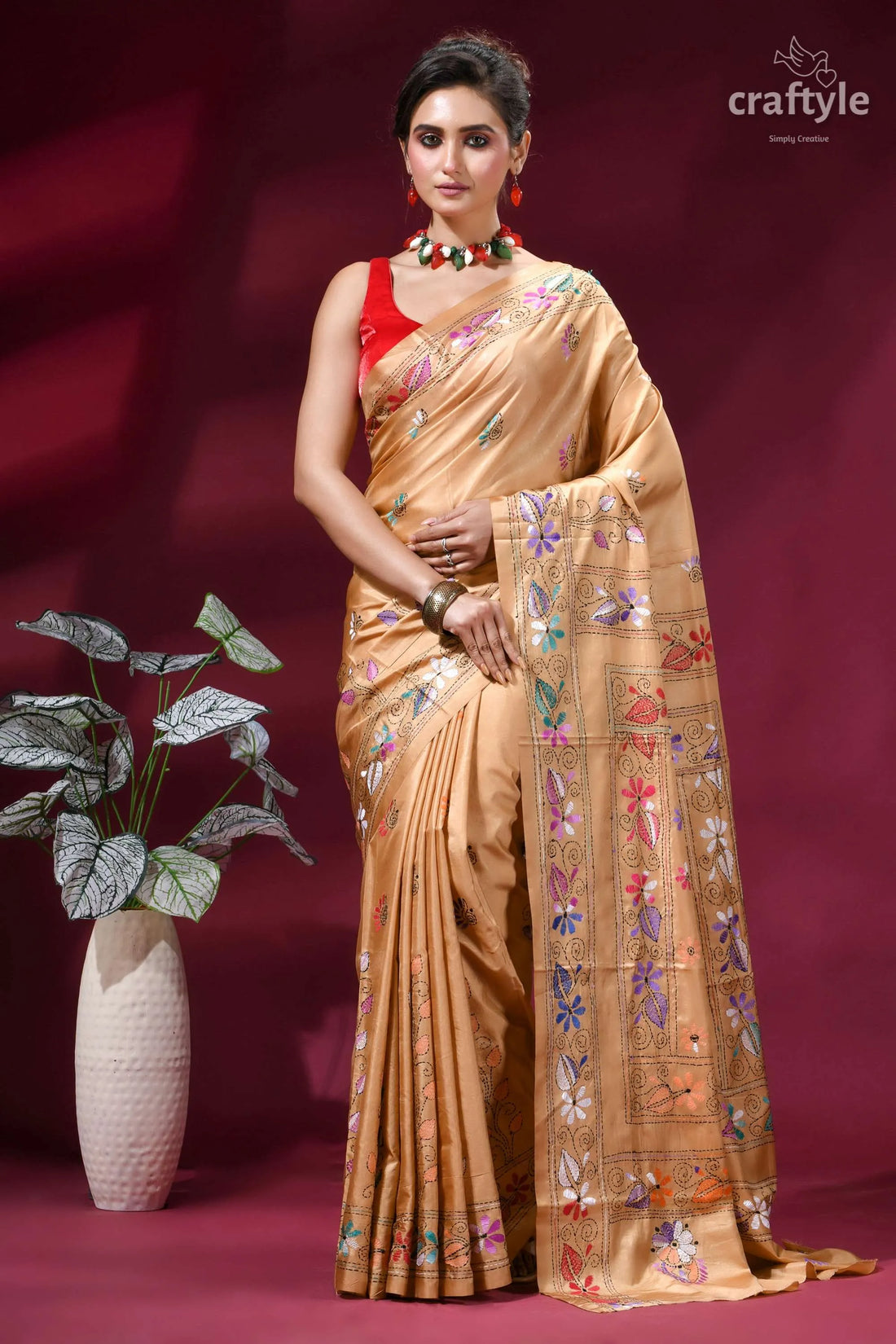 Ethnic silk kantha stitch saree in desert sand woman wears golden silk saree 1