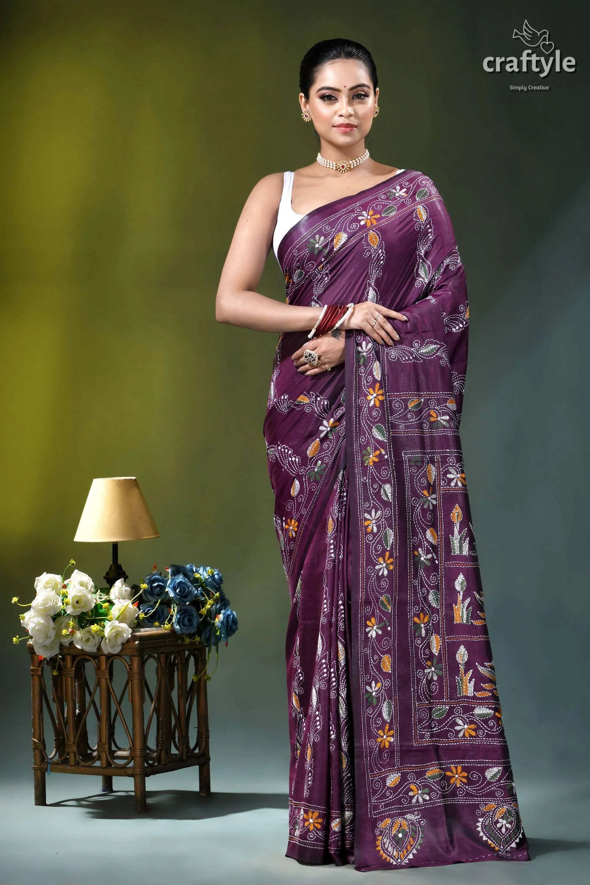 Exclusive swan motif silk kantha embroidery saree in plum purple woman wears deep purple saree 1