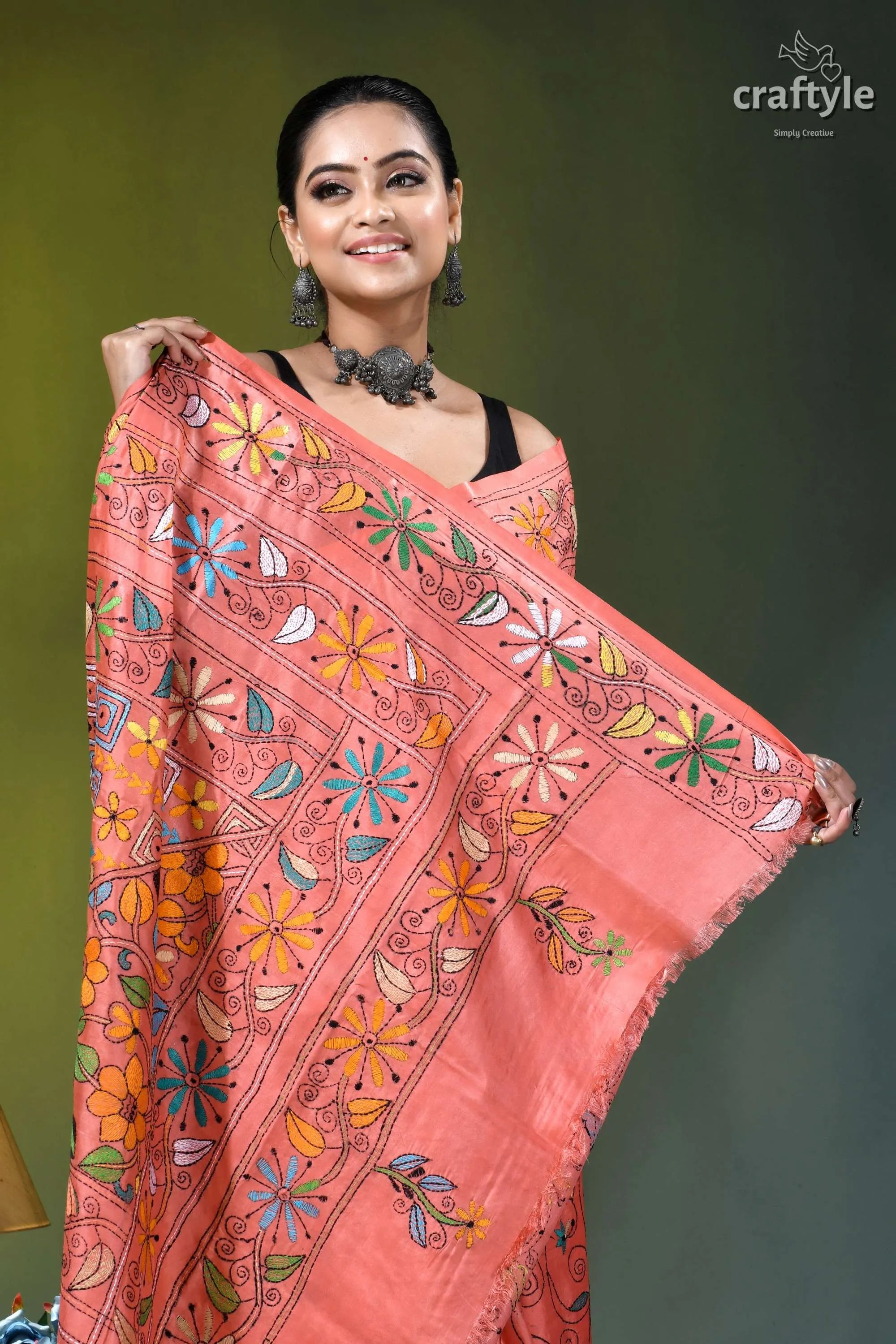 Exquisite coral pink floral design silk kantha stitch saree peach-colored silk saree adorned intricate 2