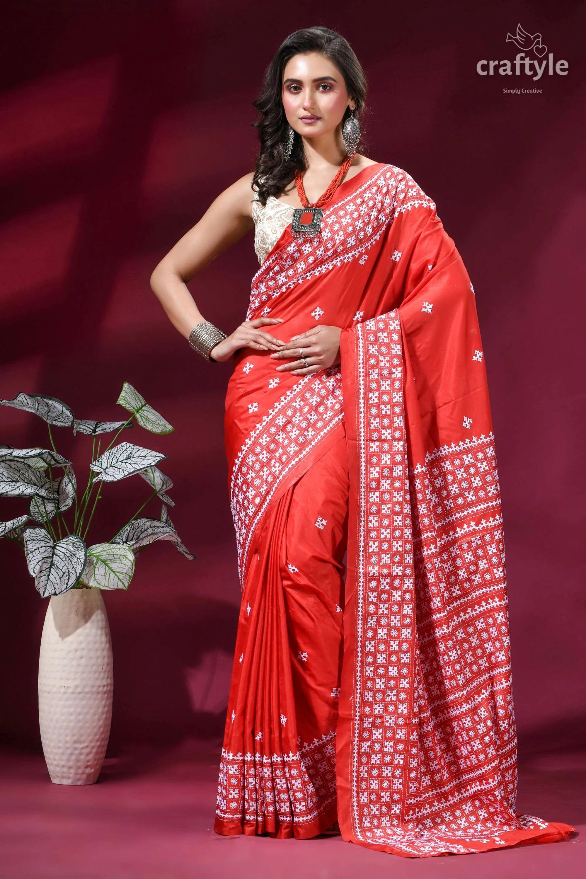Exquisite red silk saree with white thread kutch embroidery vibrant red saree intricate white 1