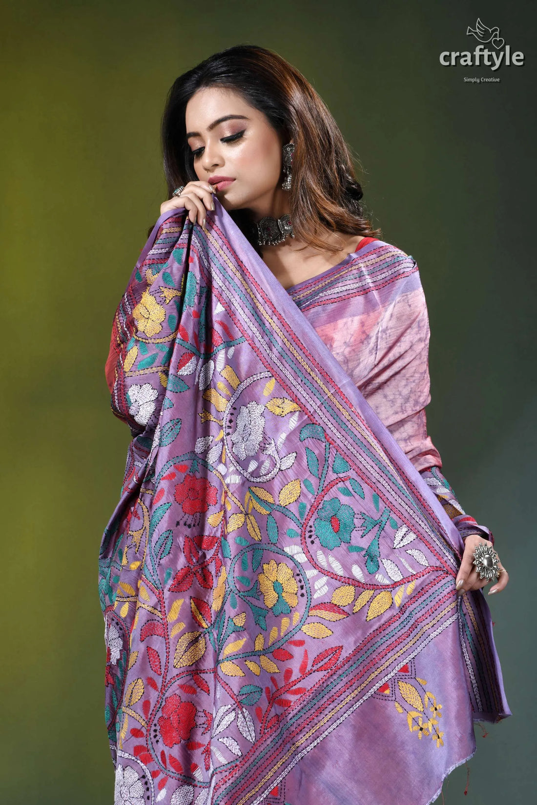 Faded pink hibiscus motif kantha stitch hand batik silk saree woman wears lavender silk saree 2