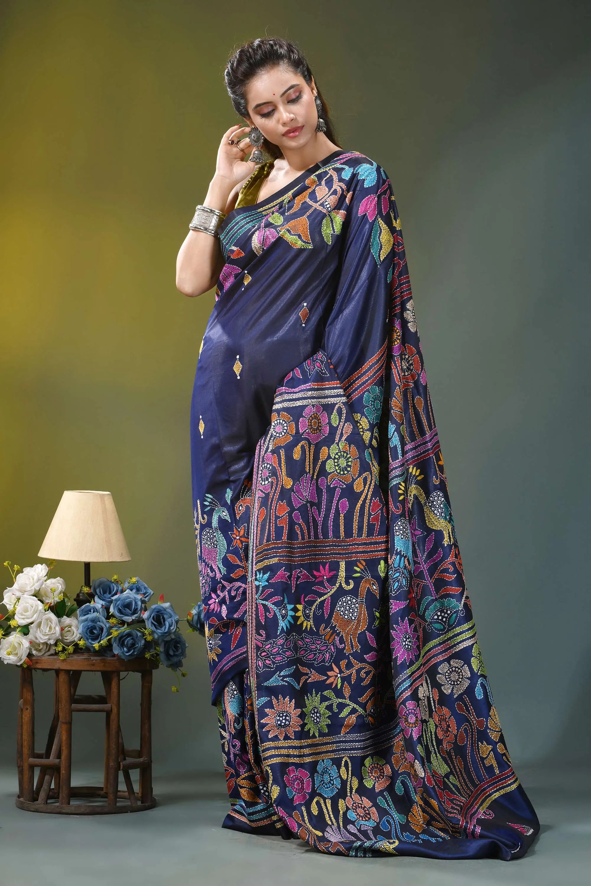Flora and fauna pattern silk kantha work saree in blue woman wears navy blue silk 4