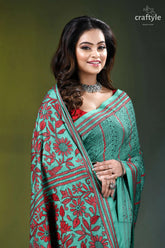 Floral motif silk kantha embroidery saree in light sea green woman wears teal red floral-patterned 2