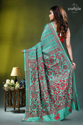 Floral motif silk kantha embroidery saree in light sea green woman wears turquoise red floral 5