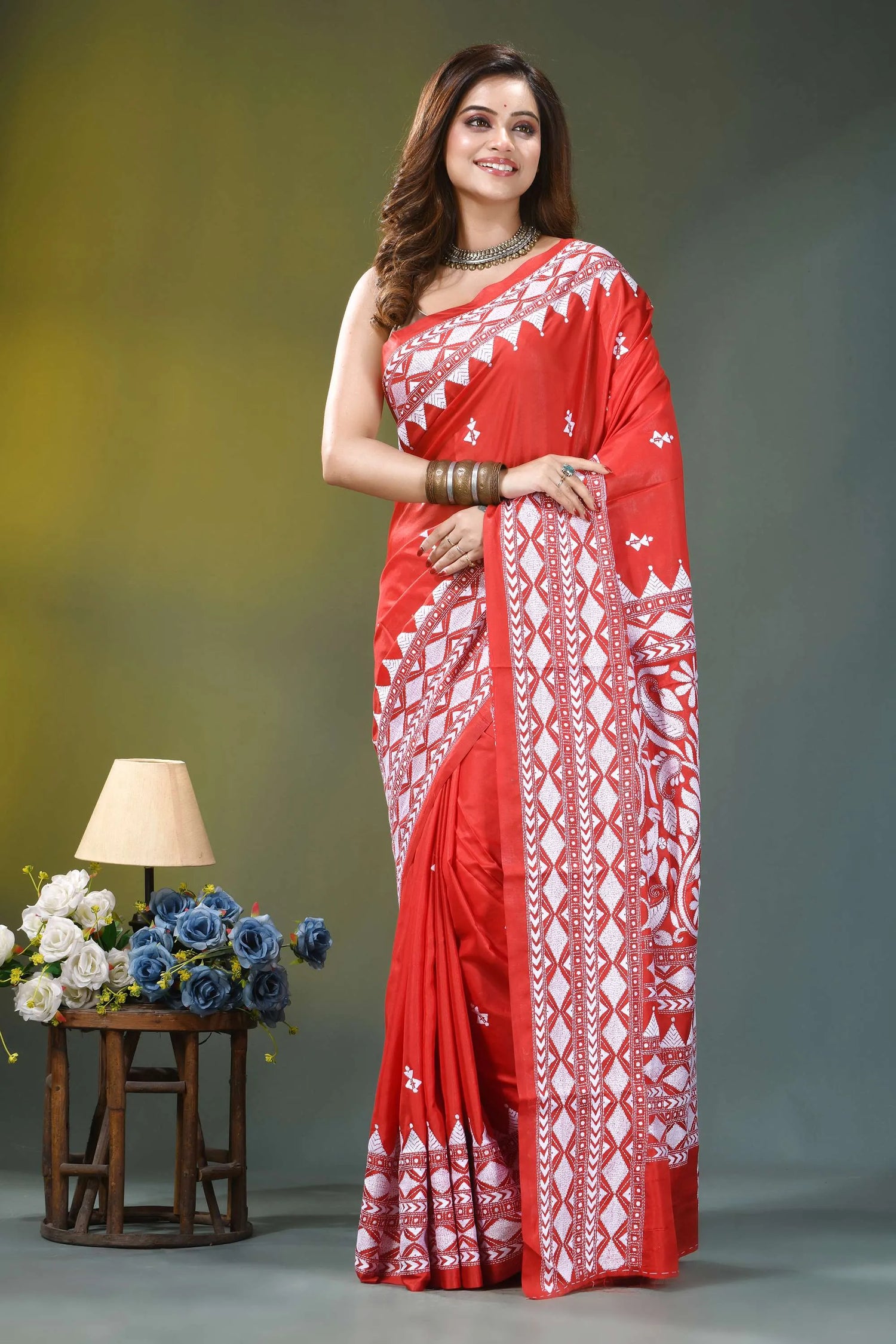 Folk motif vermilion red hand kantha embroidery silk saree vibrant red saree intricate white 2