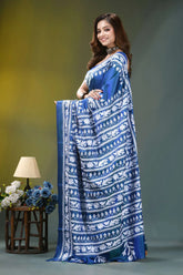 Fun blue handcrafted floral motif silk kantha stitch saree woman wears vibrant blue saree 3
