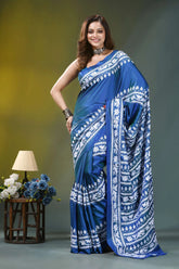 Fun blue handcrafted floral motif silk kantha stitch saree woman wears vibrant blue saree 6