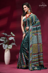 Gable green multi-thread gujrati stitch silk saree with mirror work dark green saree intricate multicolored 3