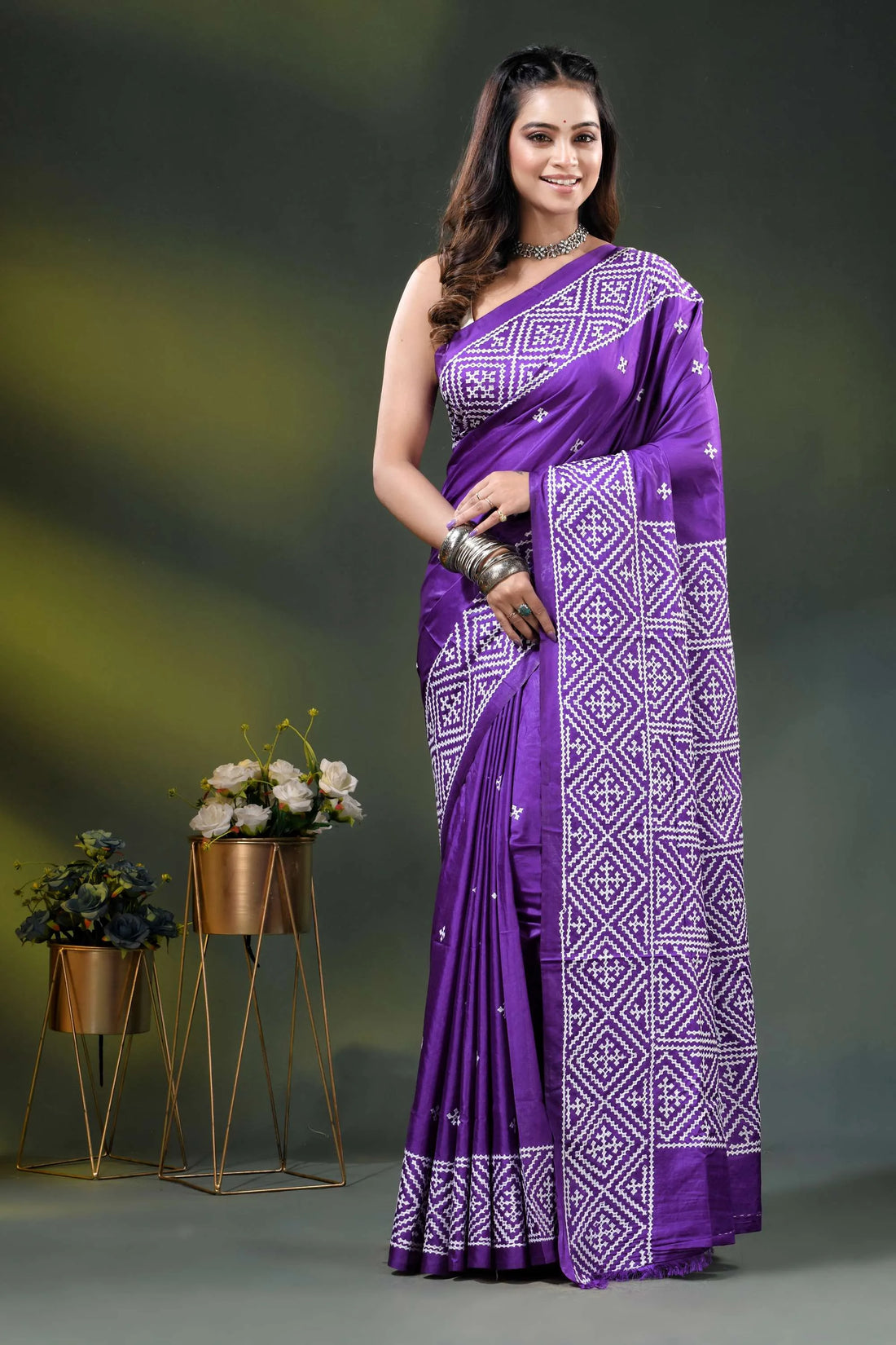 Geometric kutch work purple silk saree with handcrafted detailing 1