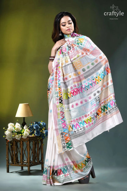 Geometric pattern multicolor hand embroidery silk lambani saree in white woman wears white saree vibrant 7