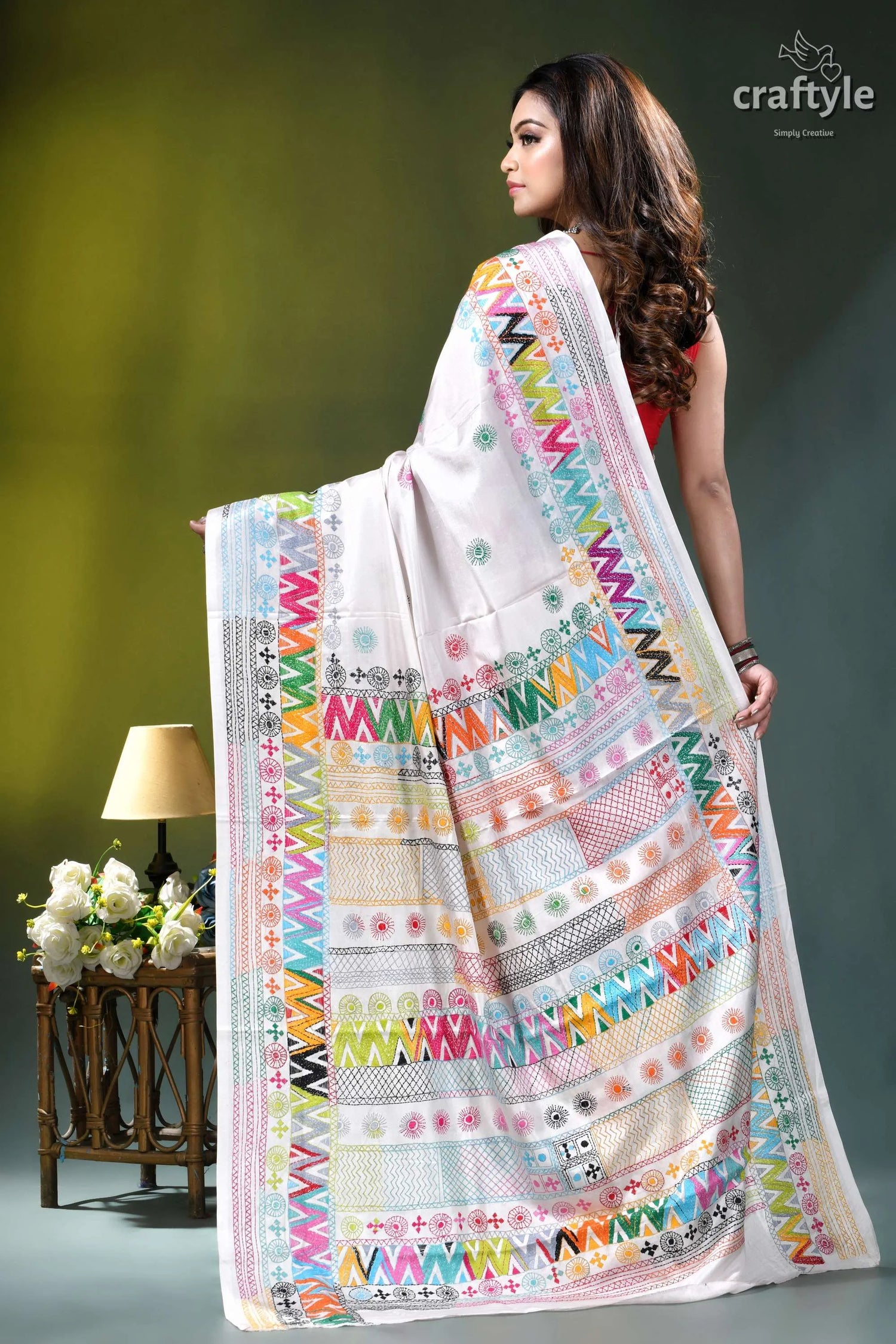 Geometric pattern multicolor hand embroidery silk lambani saree in white vibrant white silk saree adorned 4