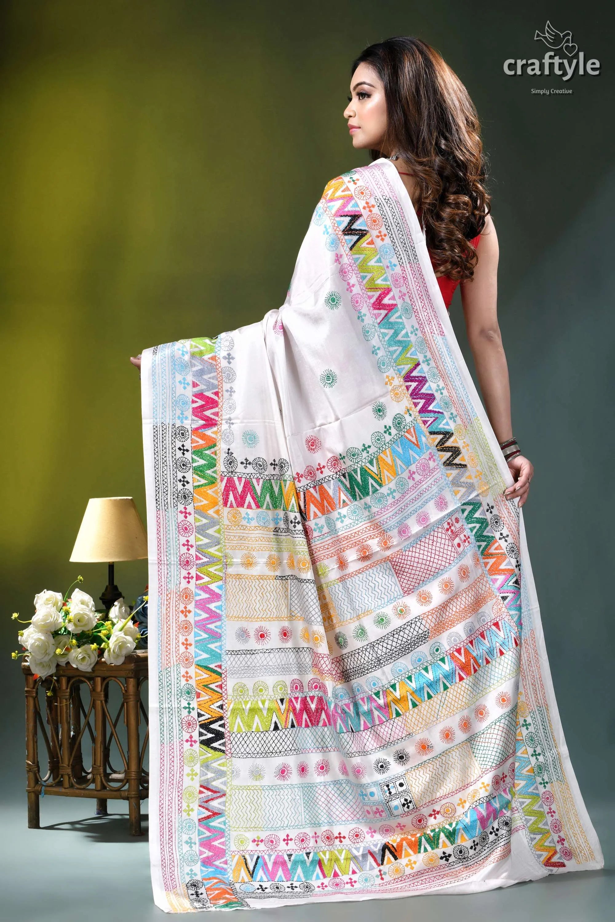 Geometric pattern multicolor hand embroidery silk lambani saree in white vibrant white silk saree adorned 4