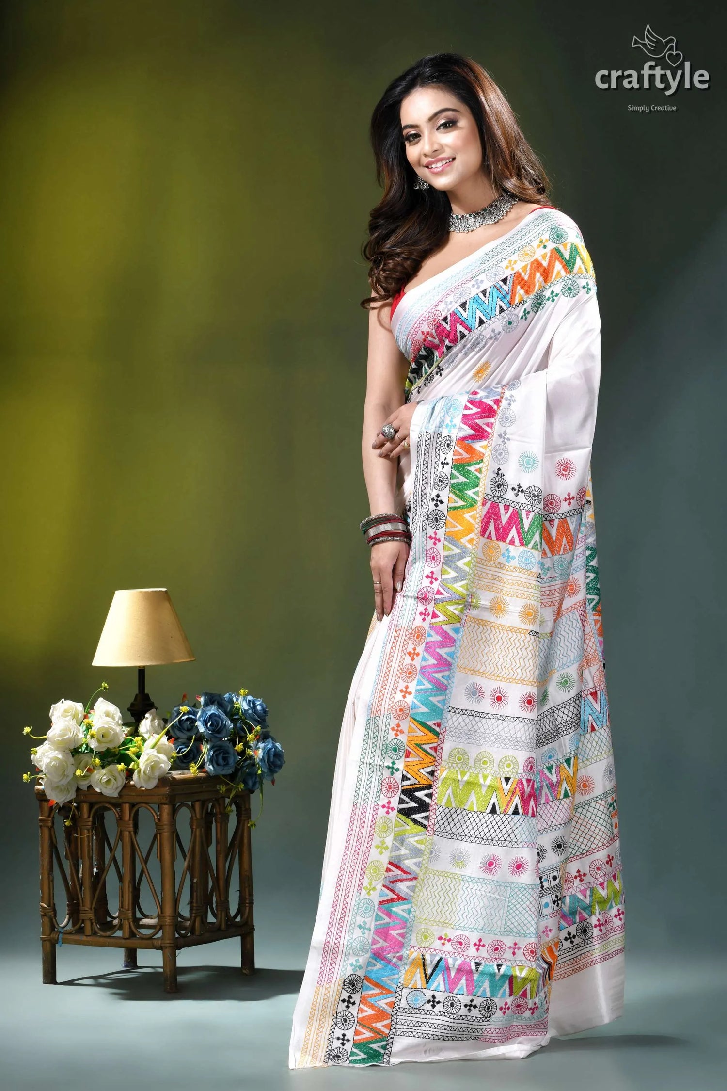 Geometric pattern multicolor hand embroidery silk lambani saree in white white saree adorned vibrant multicolored 3