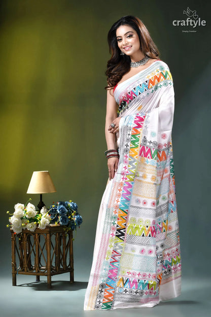 Geometric pattern multicolor hand embroidery silk lambani saree in white white saree adorned vibrant multicolored 3