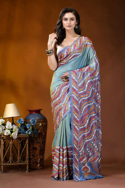 Greyish teal multi-thread ethnic design gujarati stitch dyed silk saree - mirror detailing woman wears light blue