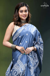 Gujrati embroidery shadow blue handcrafted exclusive silk saree woman wears blue white patterned 2