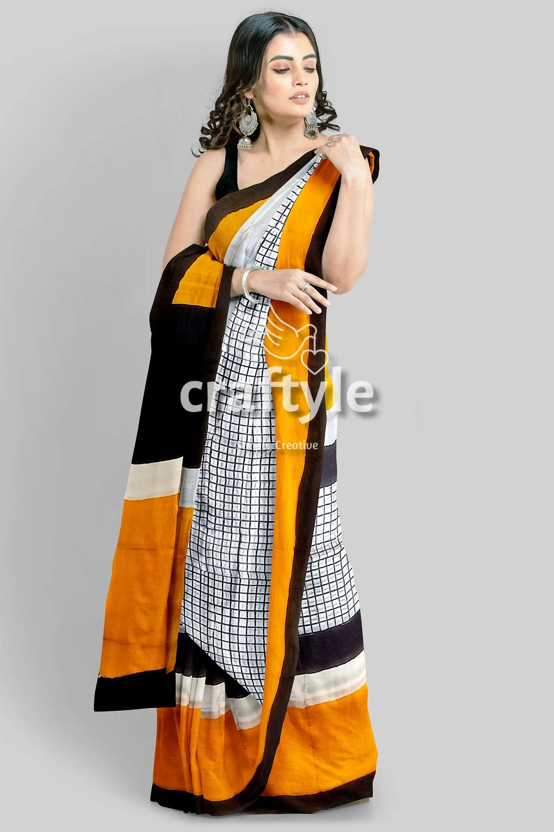 Hand block print mulberry pure silk saree - golden yellow and black woman patterned saree 1