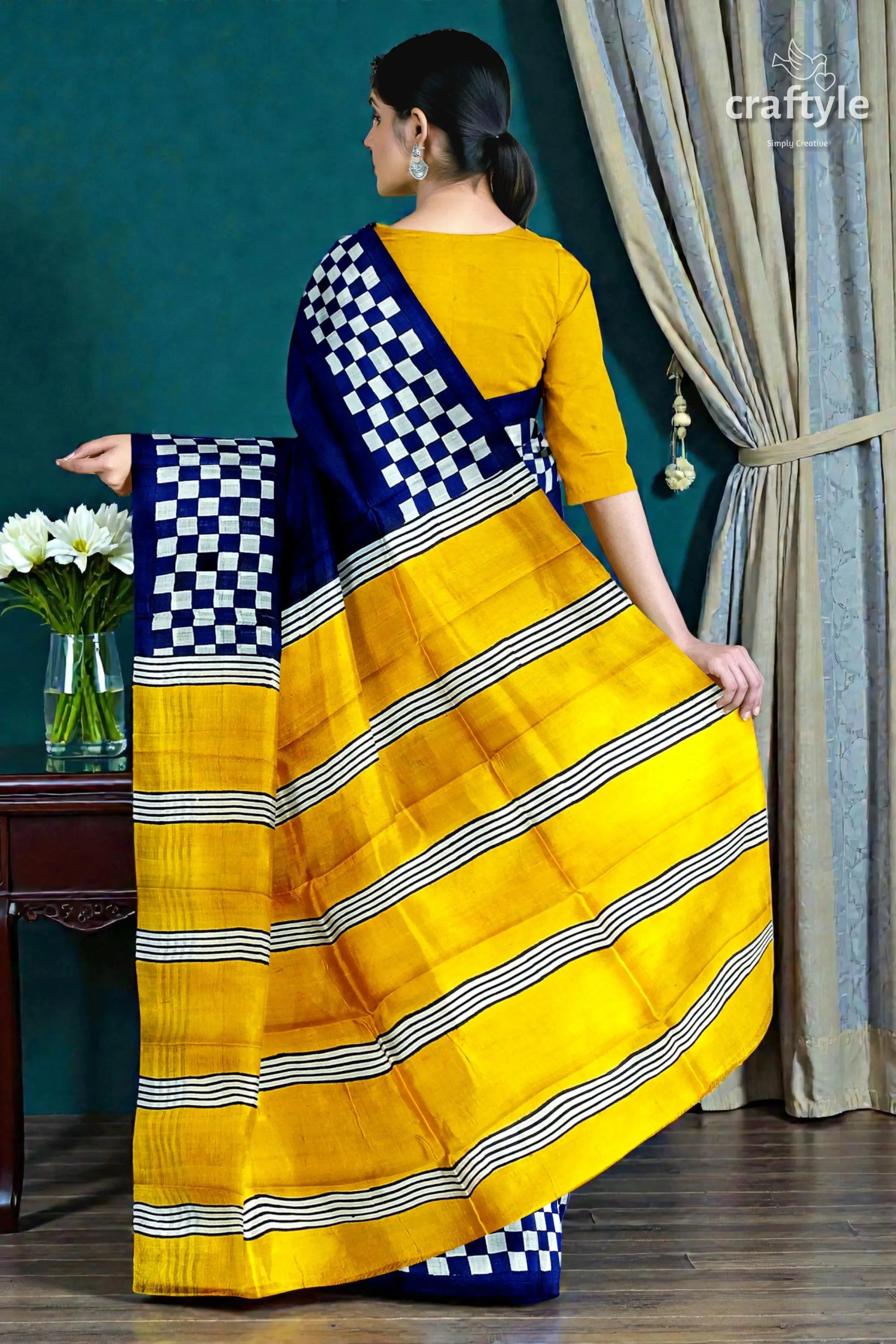 Hand block print mulberry pure silk saree in imperial blue and yellow 5