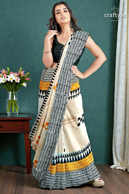 Hand block print mulberry pure silk saree - saffron yellow with black design 3