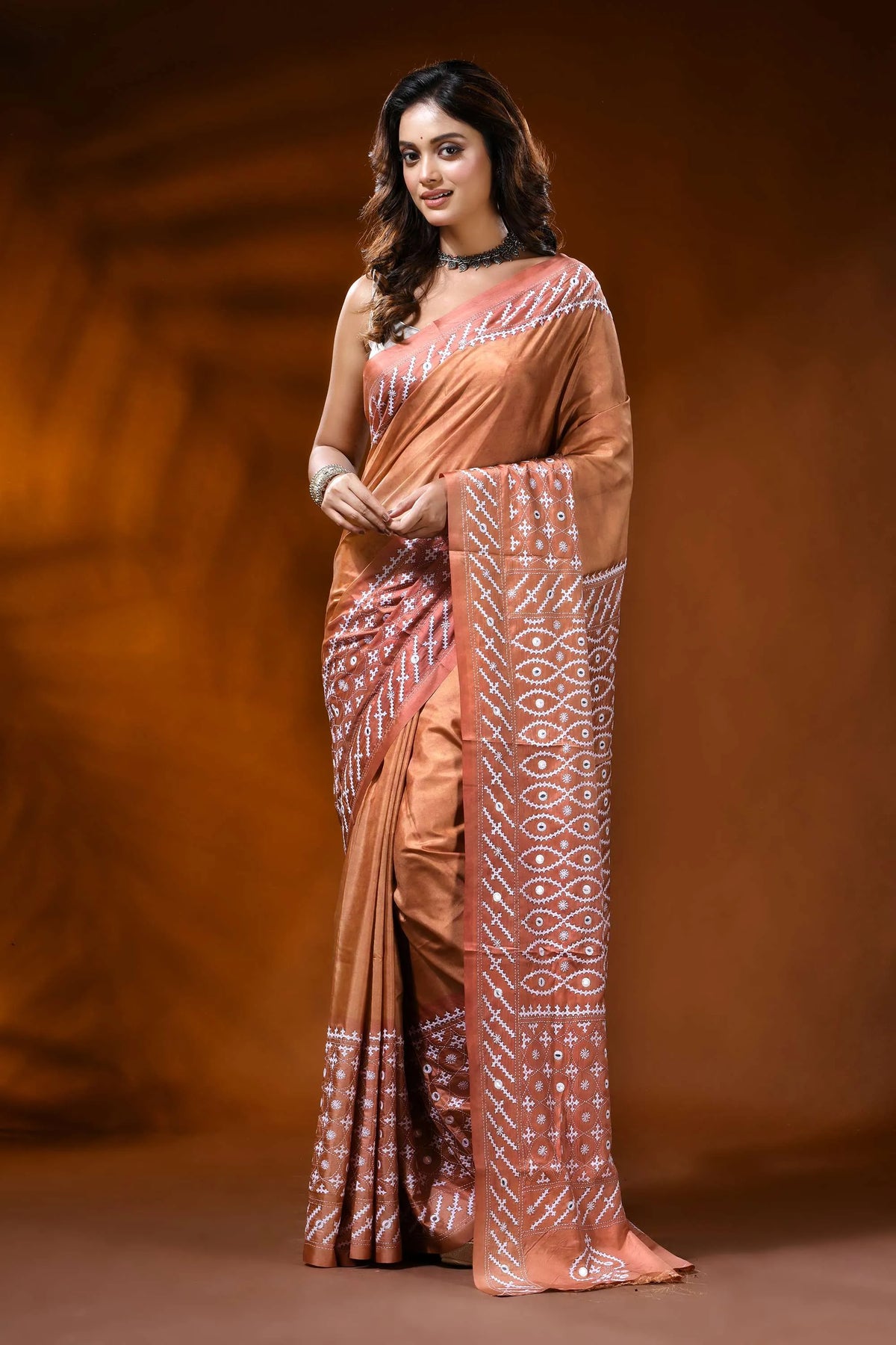 Hand embroidered peach kutch work silk saree with mirror detailing 1