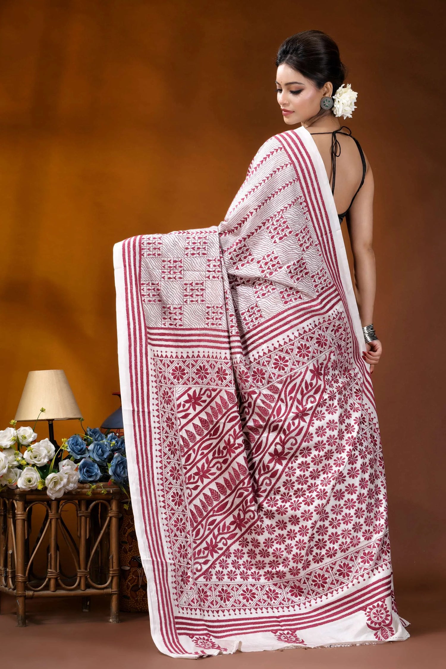 Hand embroidered white maroon floral design kantha silk saree woman wears white maroon patterned 5