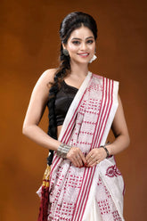 Hand embroidered white maroon floral design kantha silk saree woman wears white maroon patterned 2