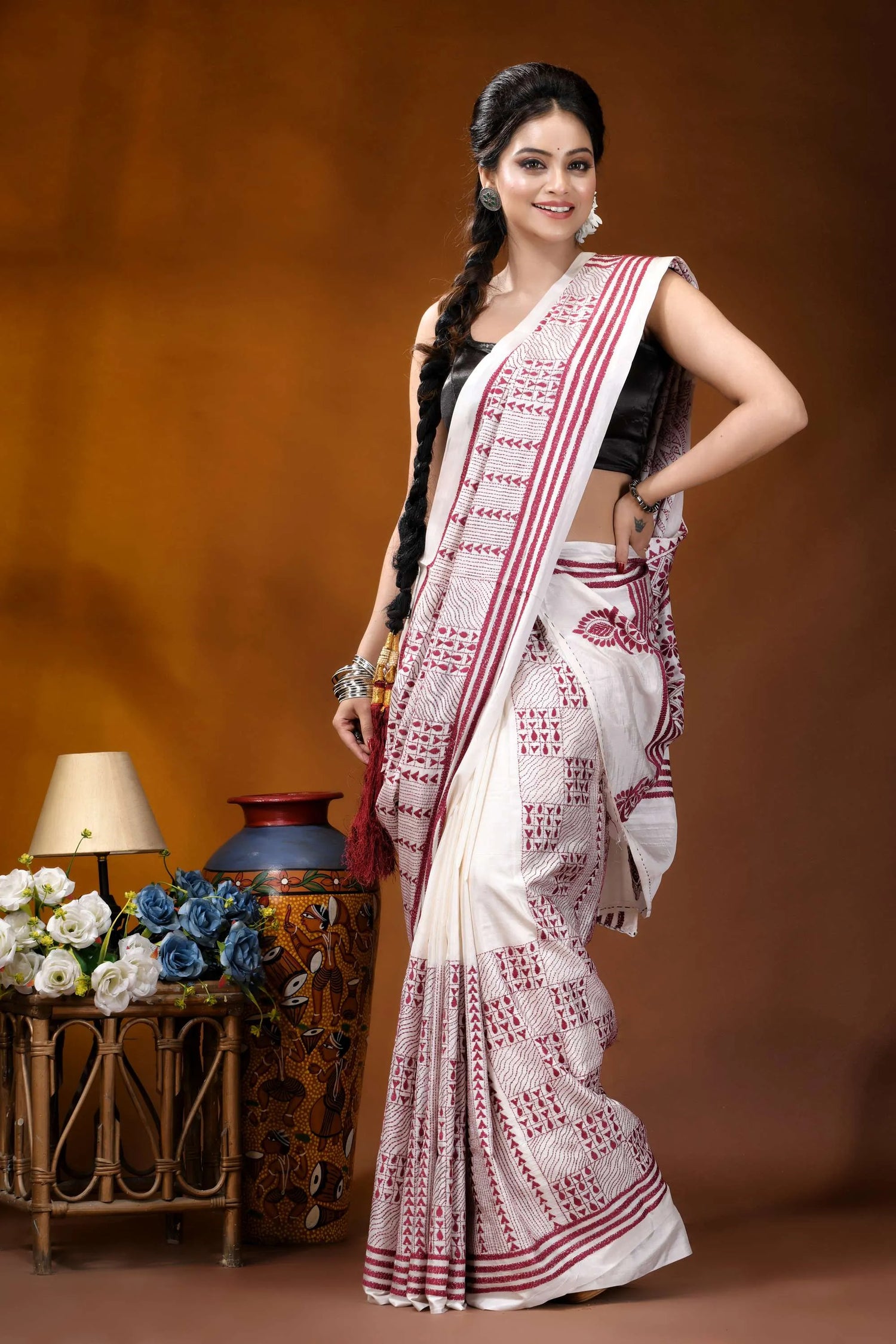 Hand embroidered white maroon floral design kantha silk saree woman wears white maroon patterned 4