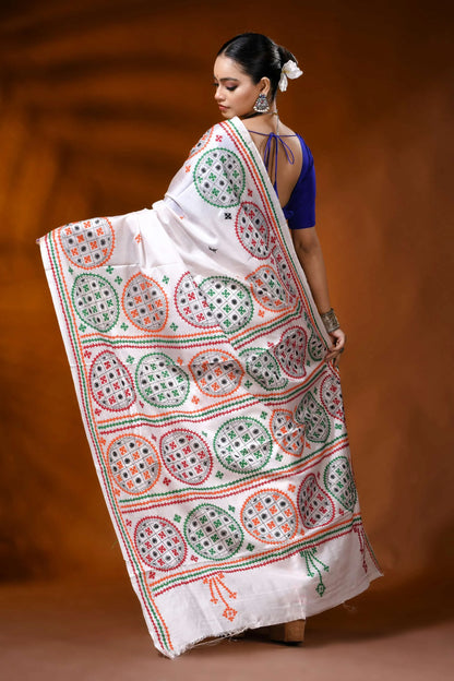 Hand embroidered white silk kutch work saree with ethnic circle design 4