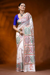 Hand embroidered white silk kutch work saree with ethnic circle design 1