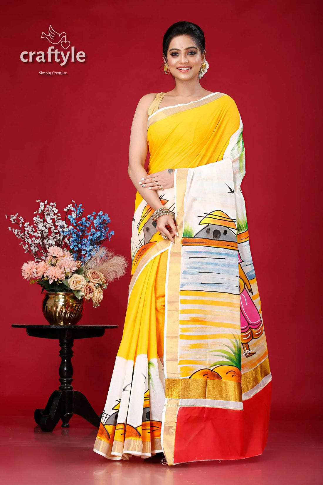 Hand-painted kerala cotton saree with village theme design yellow white hand-painted saree 1