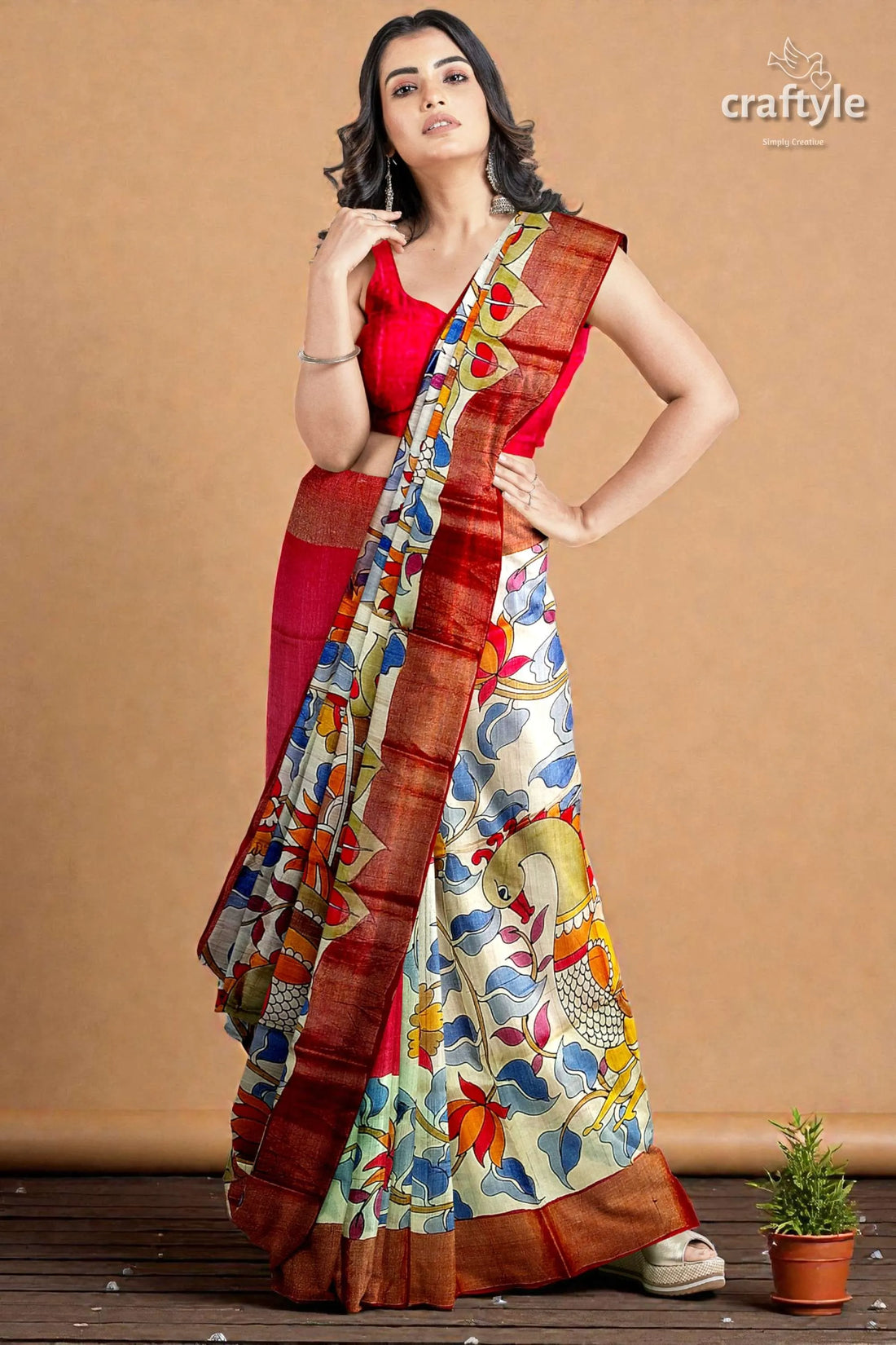 Hand painted pure tussar silk saree with zari border - stunning peacock design 1