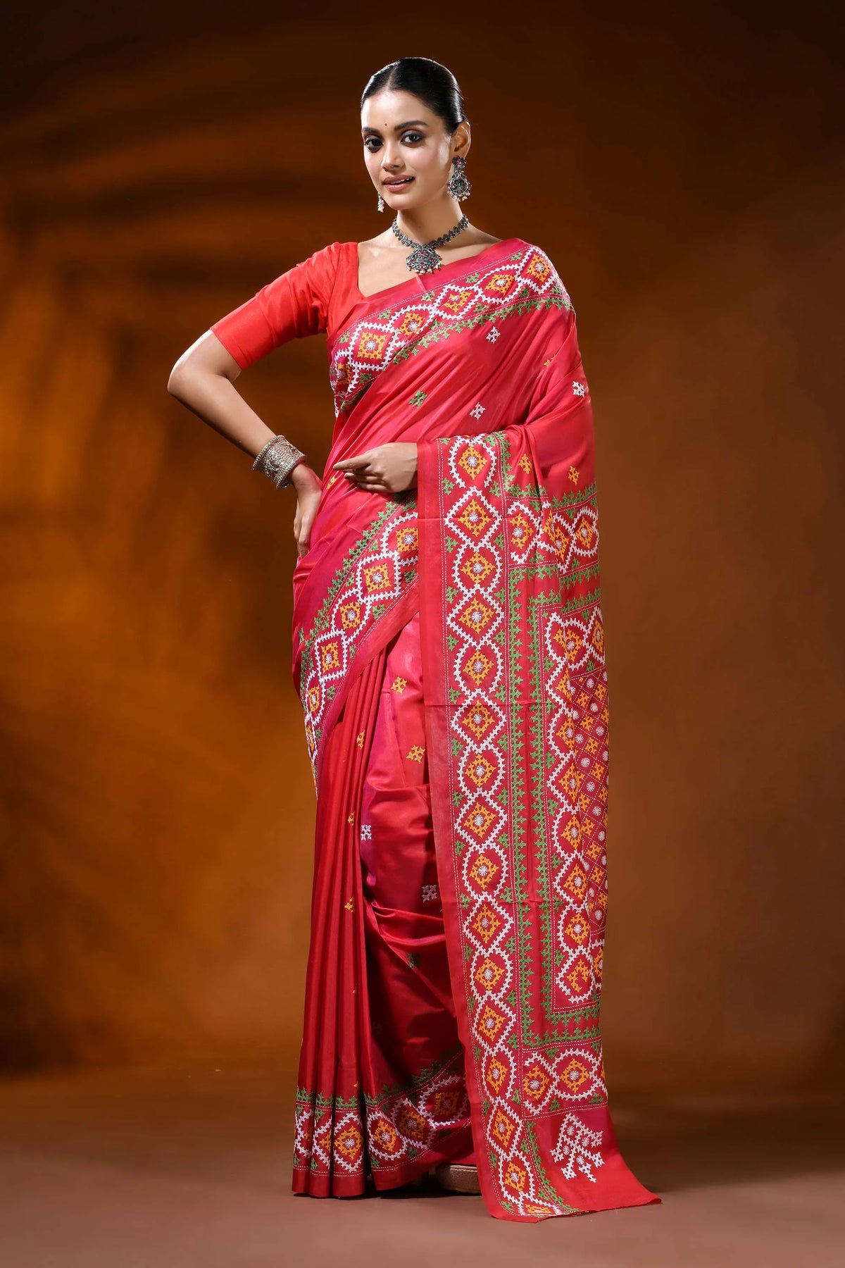 Handcrafted coral red kutch work silk saree geometric ethnic design 1