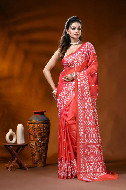 Handcrafted coral red silk kutch work saree with ethnic motifs 1