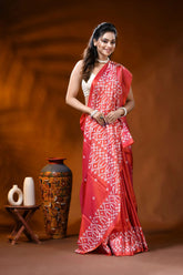 Handcrafted coral red silk kutch work saree with ethnic motifs 4