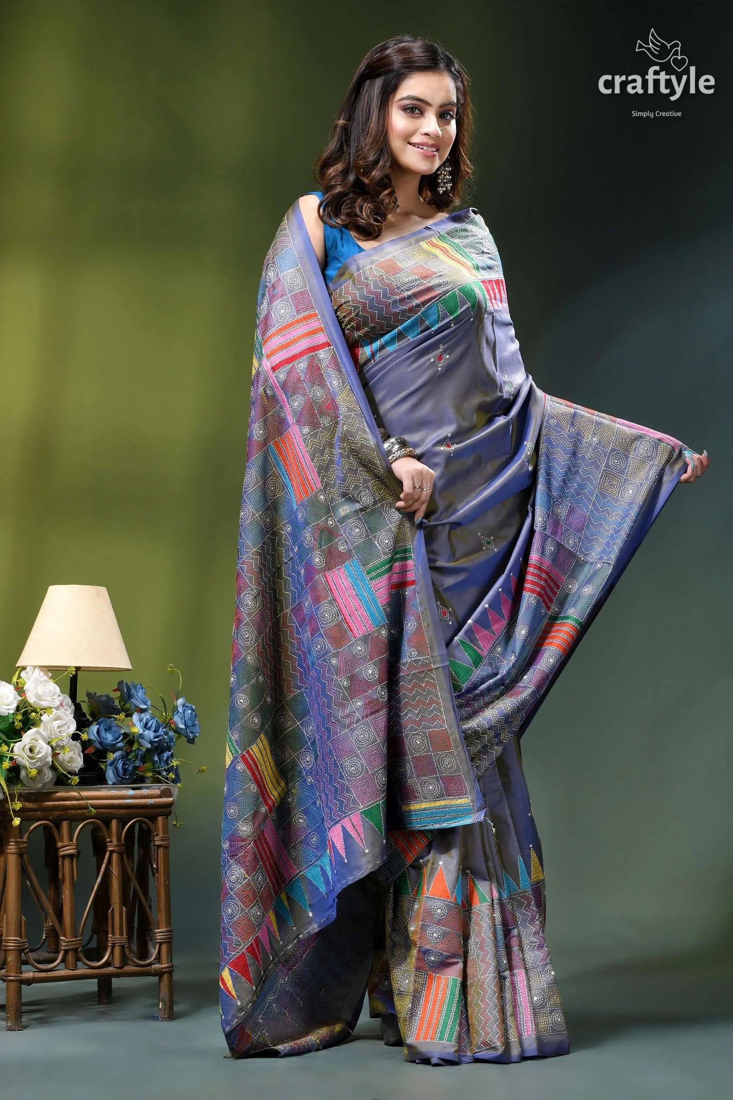 Handcrafted geometric design silk kantha work saree in cool grey woman wears vibrant patterned saree 5