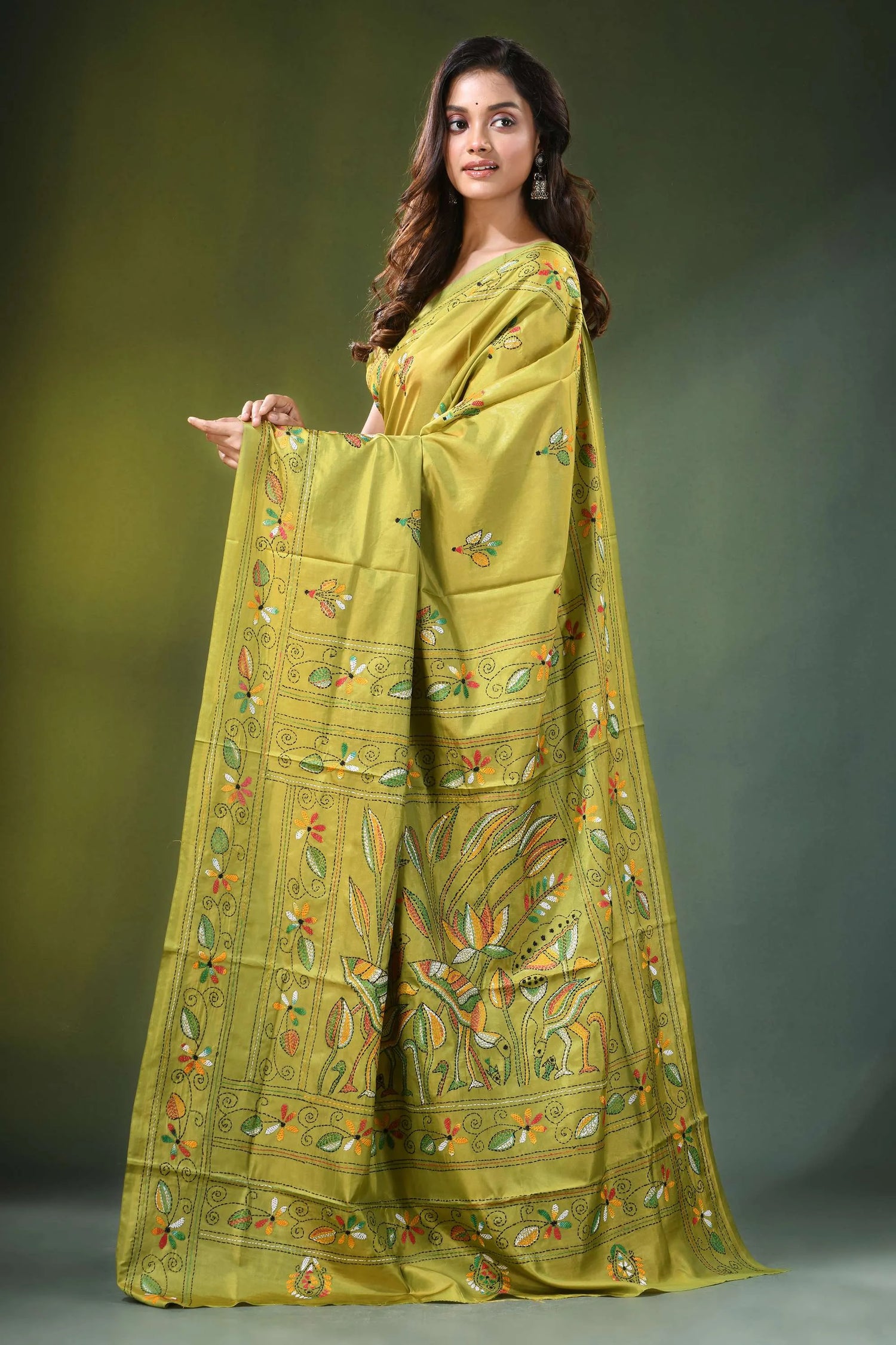 Handcrafted leaf green silk kantha saree with heron and lotus motif vibrant olive-green adorned intricate 3