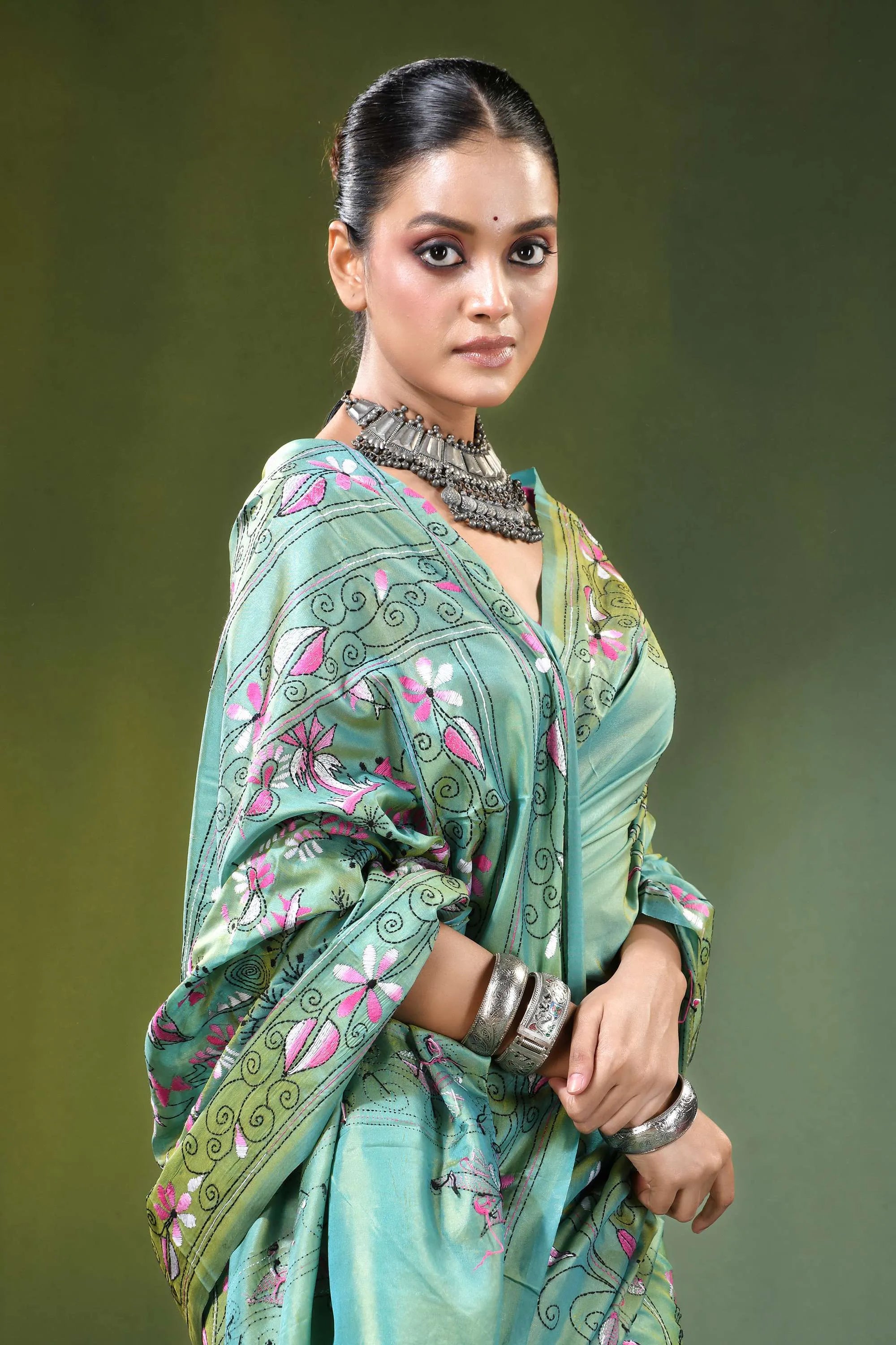 Handcrafted nature theme silk kantha stitch saree in sea green woman wears light 2